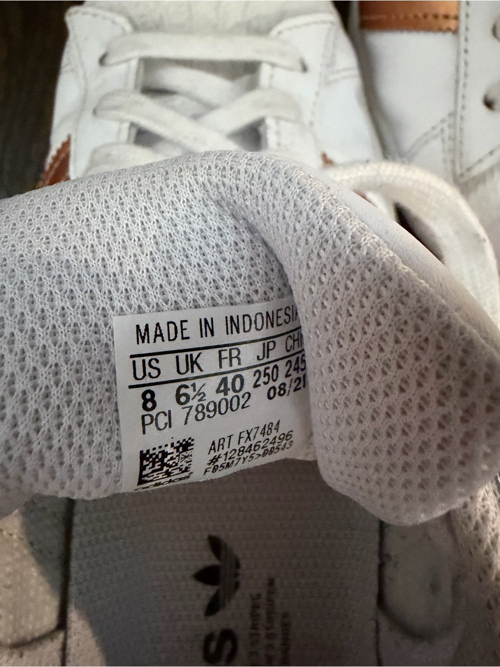 Gently used Adidas Women’s Superstar White Sneakers with Copper Accent